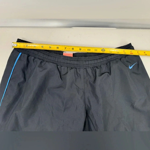 Nike The Athletic Dept. Women's size L Cropped Track Pants Mesh Lined Black - Picture 6 of 9